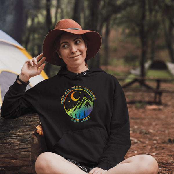 This hoodie features a colorful mountain graphic on the front and the inspiring saying "Not All Who Wander Are Lost" printed on the front.
